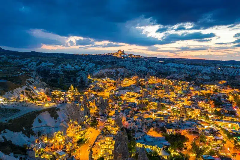a city of Cappadocia lit up at night with best Turkey luxury tours and vacations 