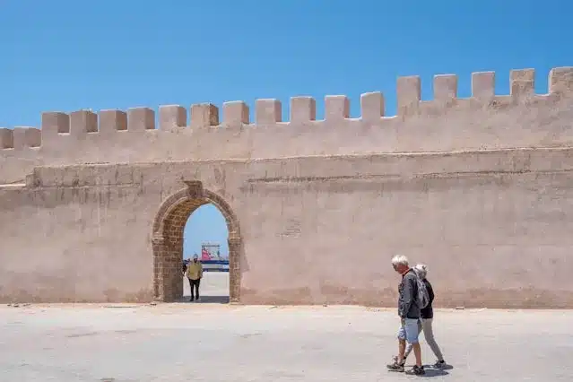 Two Tourists Walking Safely in the City of Essaouira 