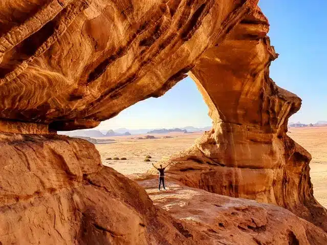 Tourist Standing in Wadi Rum while a Trip to Jordan