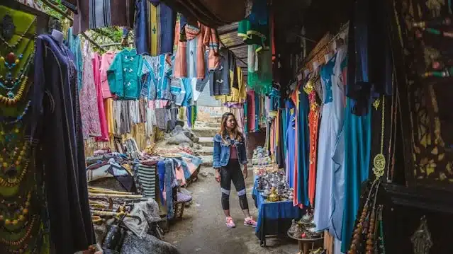 Asian Woman in Front of Moroccan Local Shop 