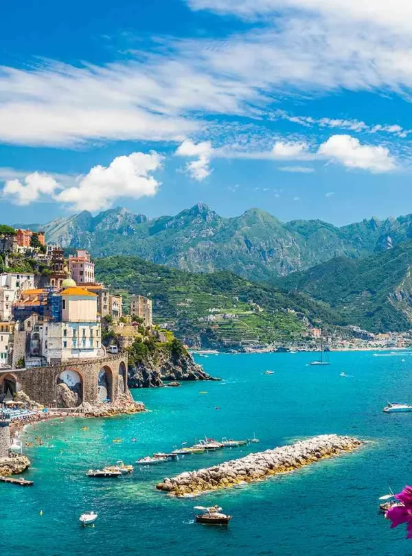 1. Scenic view of the Amalfi Coast in Italy, showcasing its stunning cliffs and vibrant coastal villages while our Italy itnerary 14 days