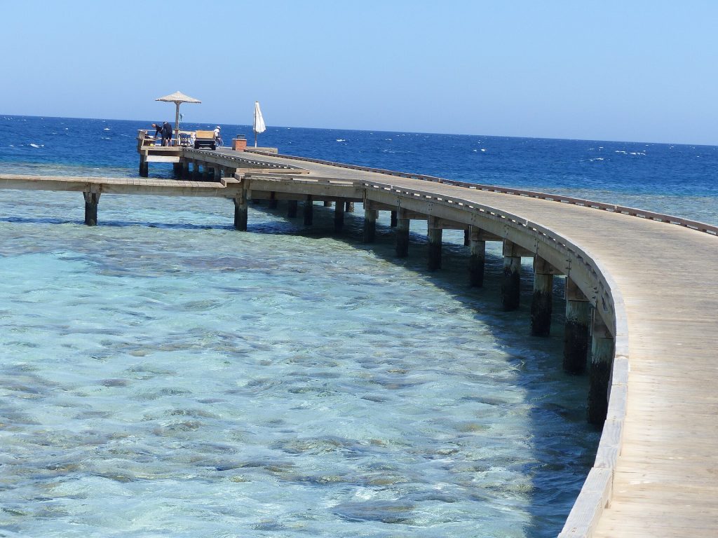 Egypt 14-Day Luxury Private Tour 18 A long jetty over clear water at Soma Bay on the Red Sea