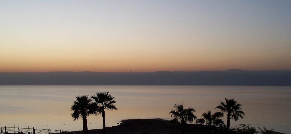 Jordan 8-Day Luxury Private Tour 9 Sunrise over the calm water of the Dead Sea, Jordan