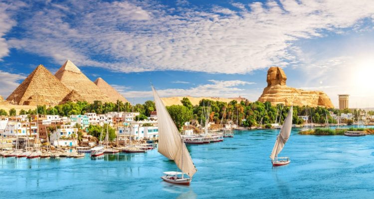 Skyline panorama of Aswan city on the way to the Great Sphinx and Pyramids of Egypt